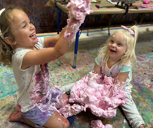 Children painting in Artnest Studio class